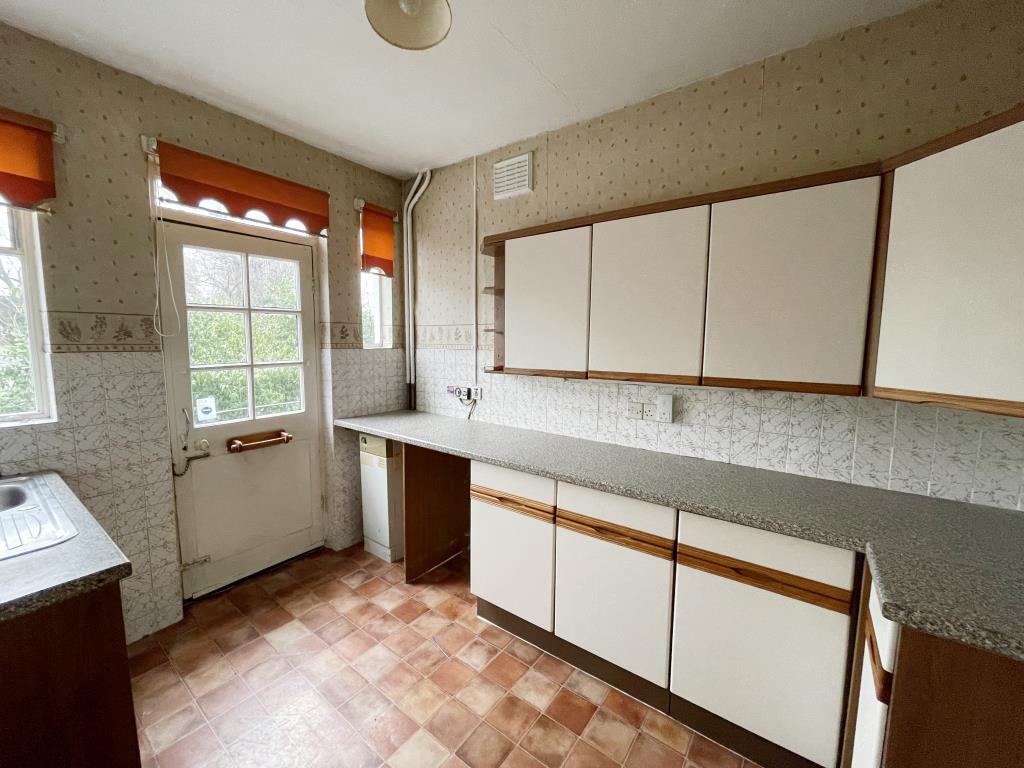 Lot: 43 - TWO-BEDROOM MAISONETTE FOR IMPROVEMENT - Kitchen with access to rear of property